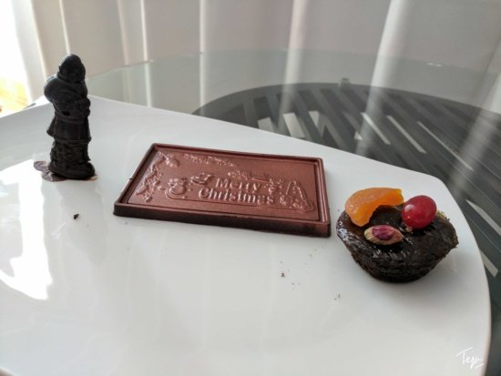 a chocolate bar and a chocolate cake on a table