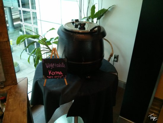 a large black pot on a table