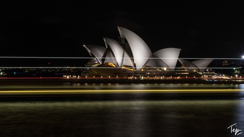 Sydney Opera House with pointed roof at night
