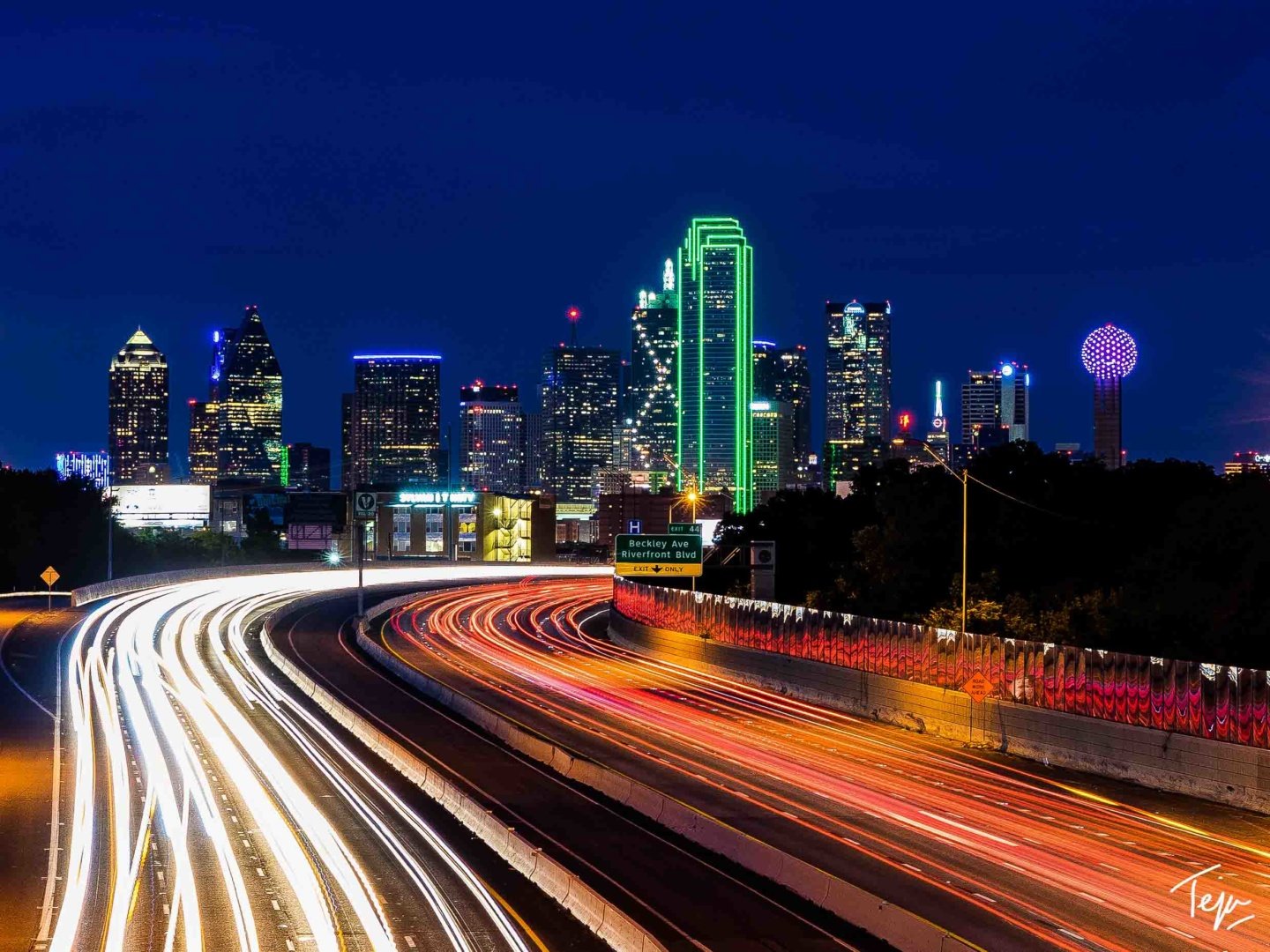 a city skyline with lights on it