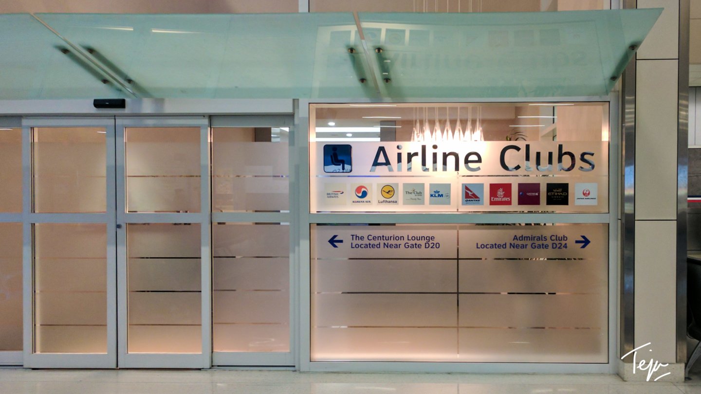 a glass door with signs on it