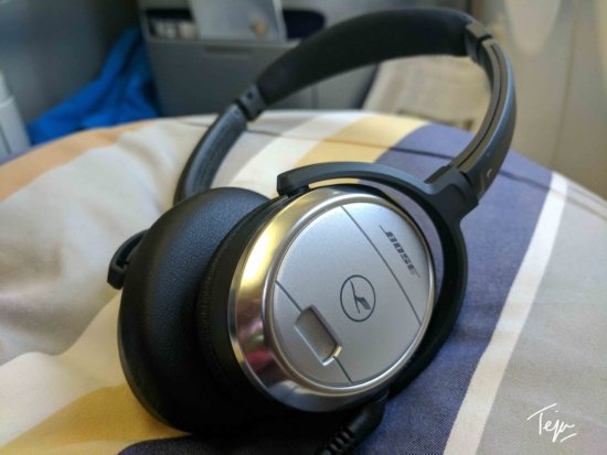 a headphones on a bed
