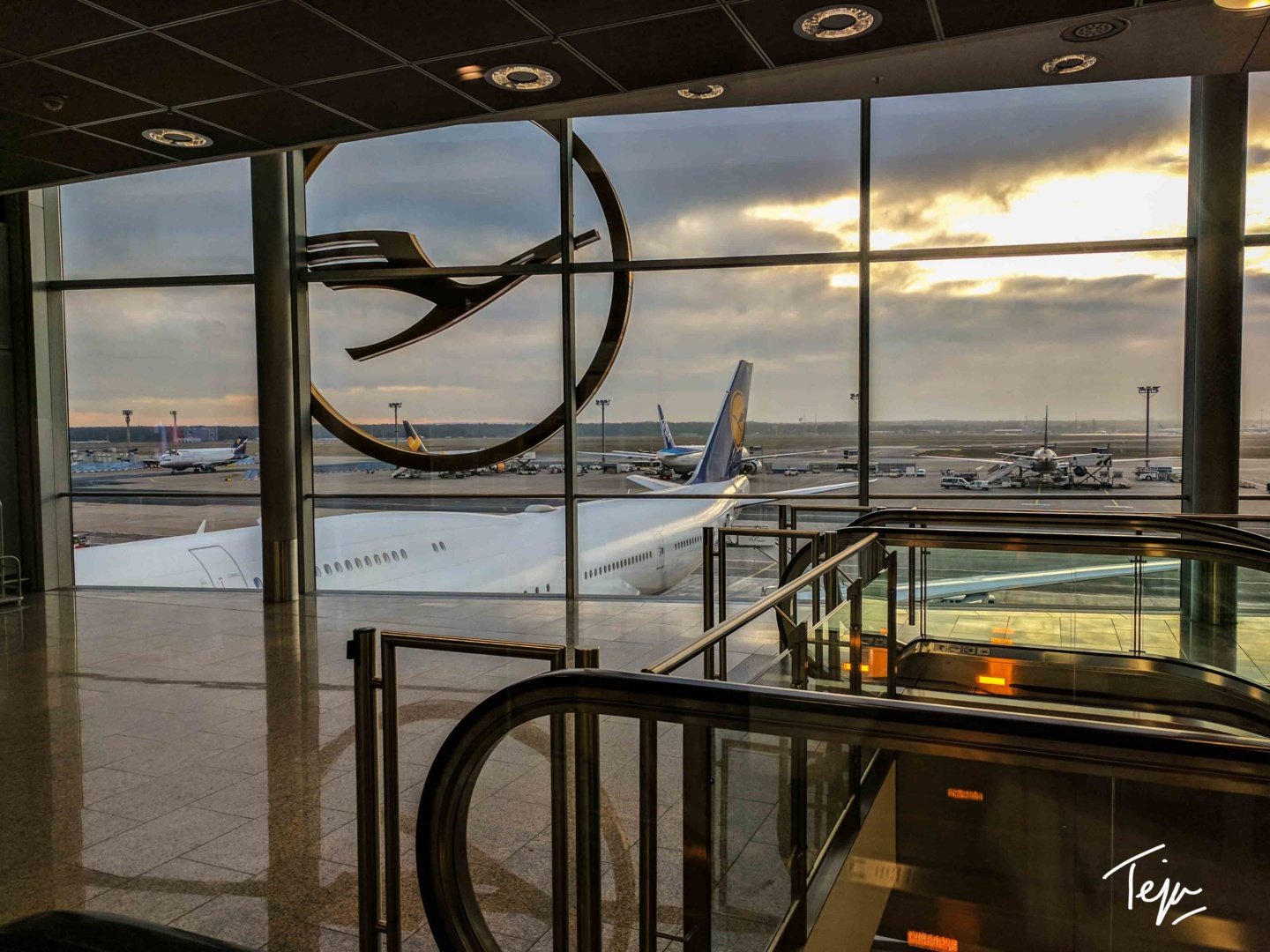 an airport with an airplane in the background
