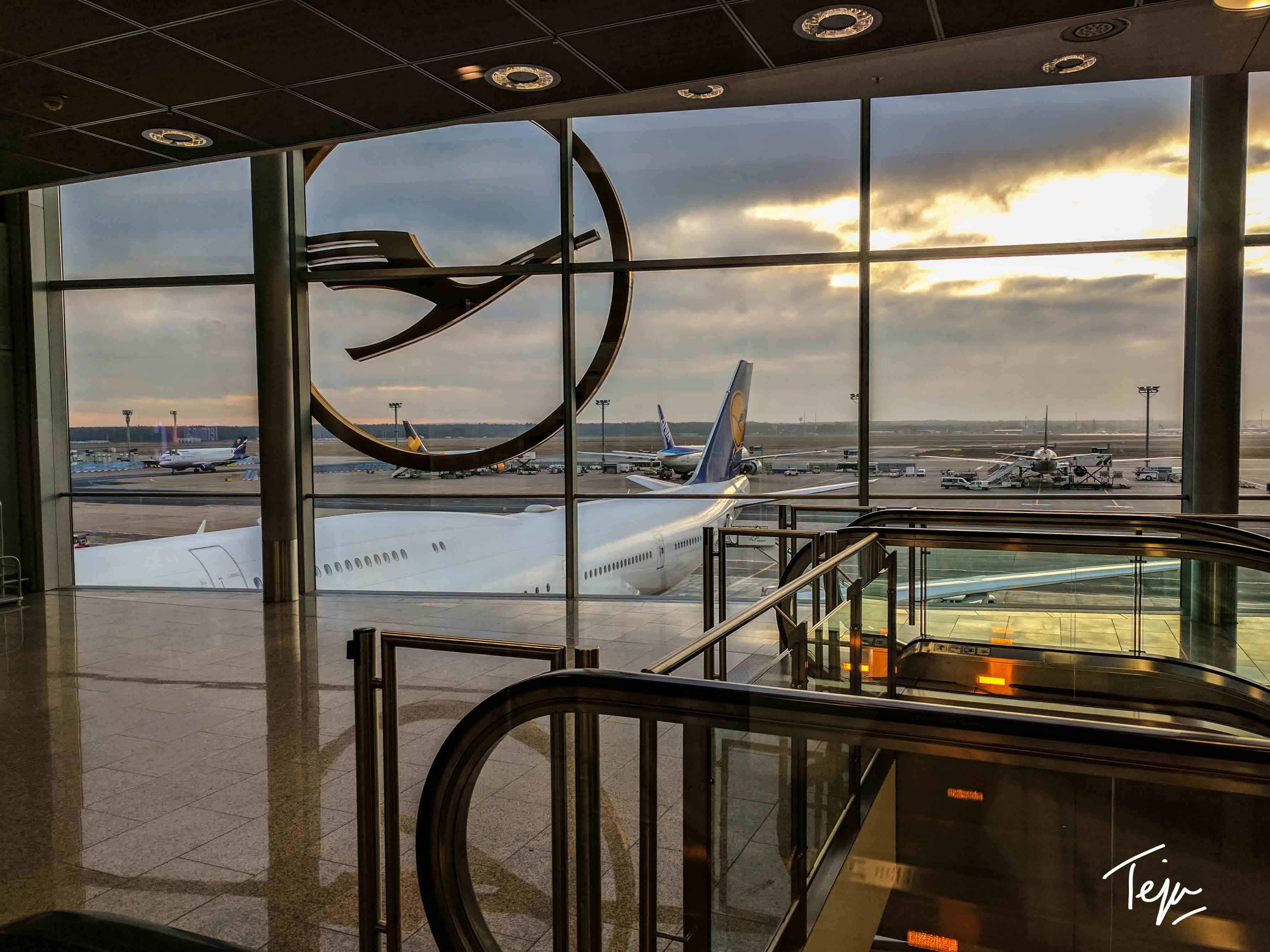 an airport with an airplane in the background