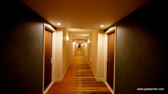 a long hallway with several doors
