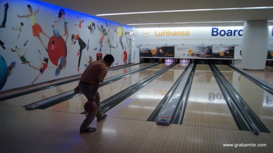 a man holding a bowling ball