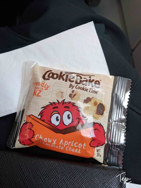 a package of cookies on a person's lap
