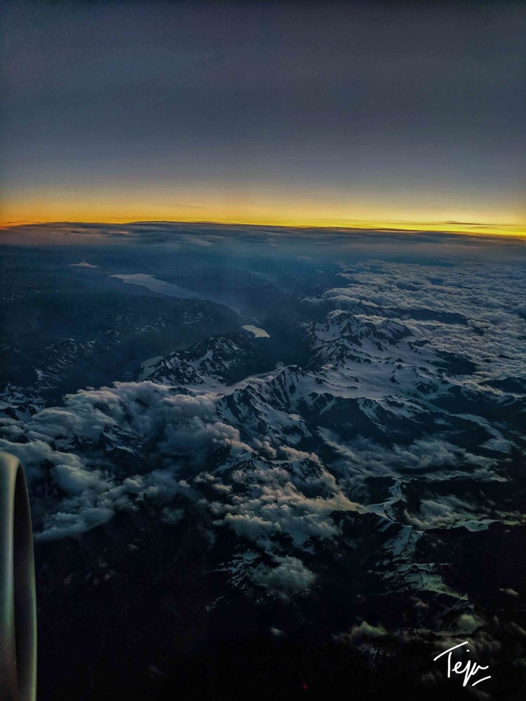 a view of the mountains from an airplane window