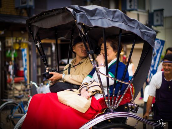 a man and woman in a carriage
