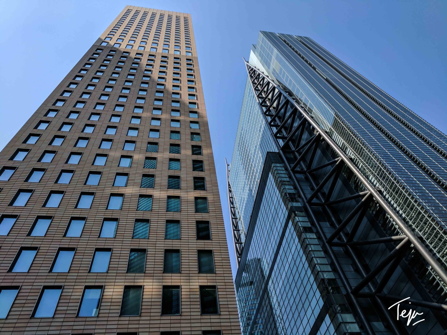 a low angle view of tall buildings