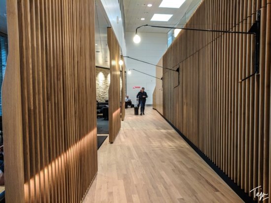 a long hallway with wood slats