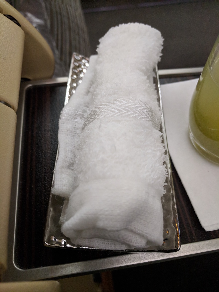 a white towel on a plate