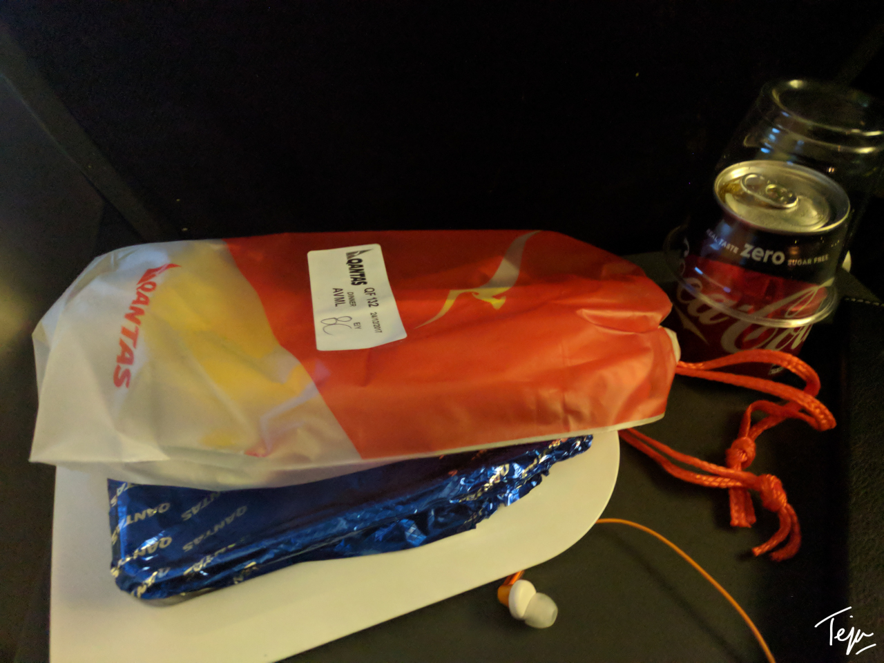 a bag of food and a soda