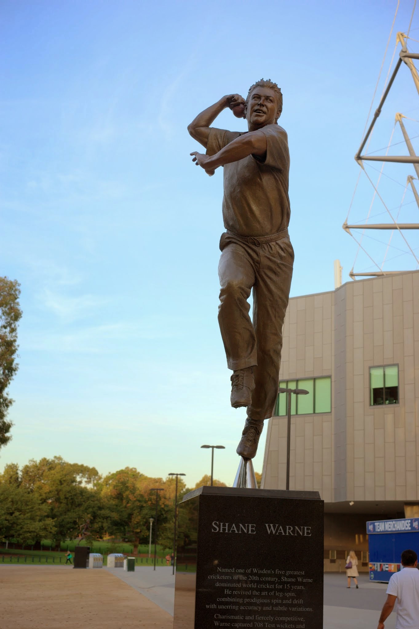 a statue of a man throwing a baseball