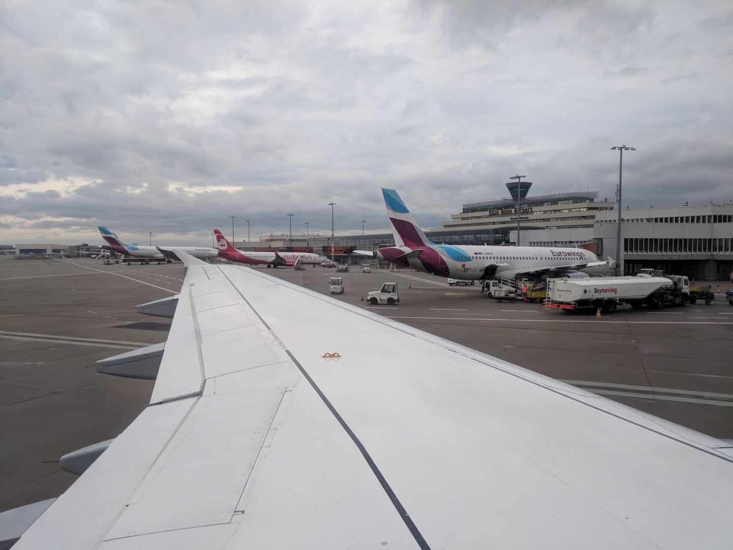 an airplane wing at an airport