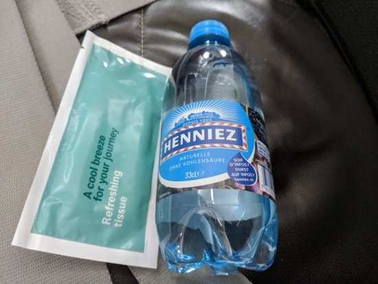 a bottle of water and a packet of water