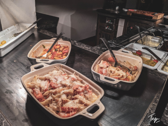 a group of casseroles in a kitchen