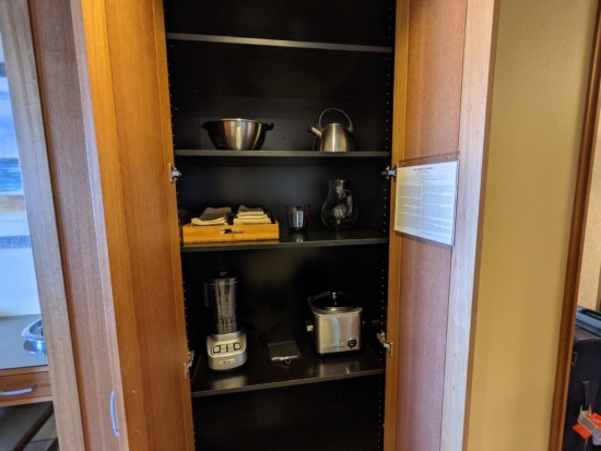 a shelf with appliances on it