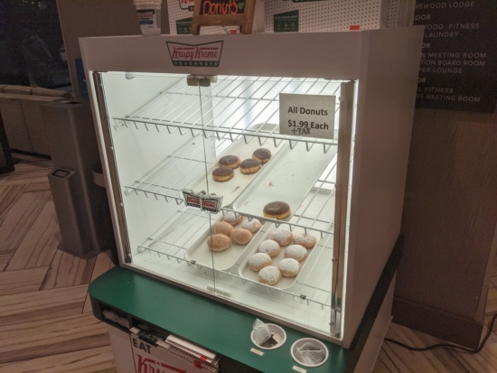 a display case with donuts in it