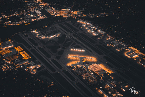 an aerial view of an airport at night