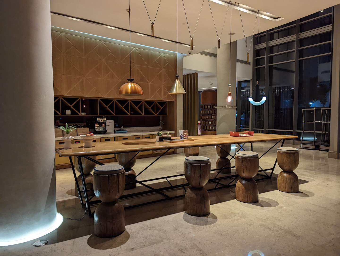 a table with stools in a room