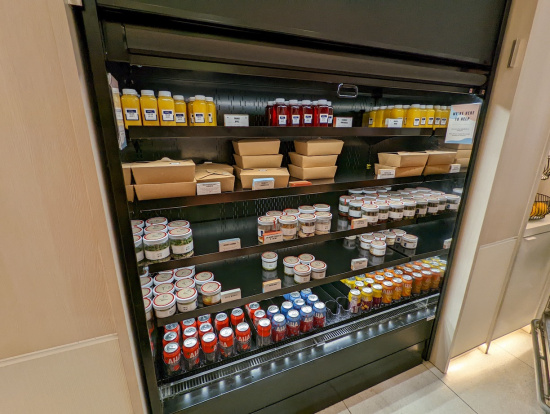 a display case with different types of food