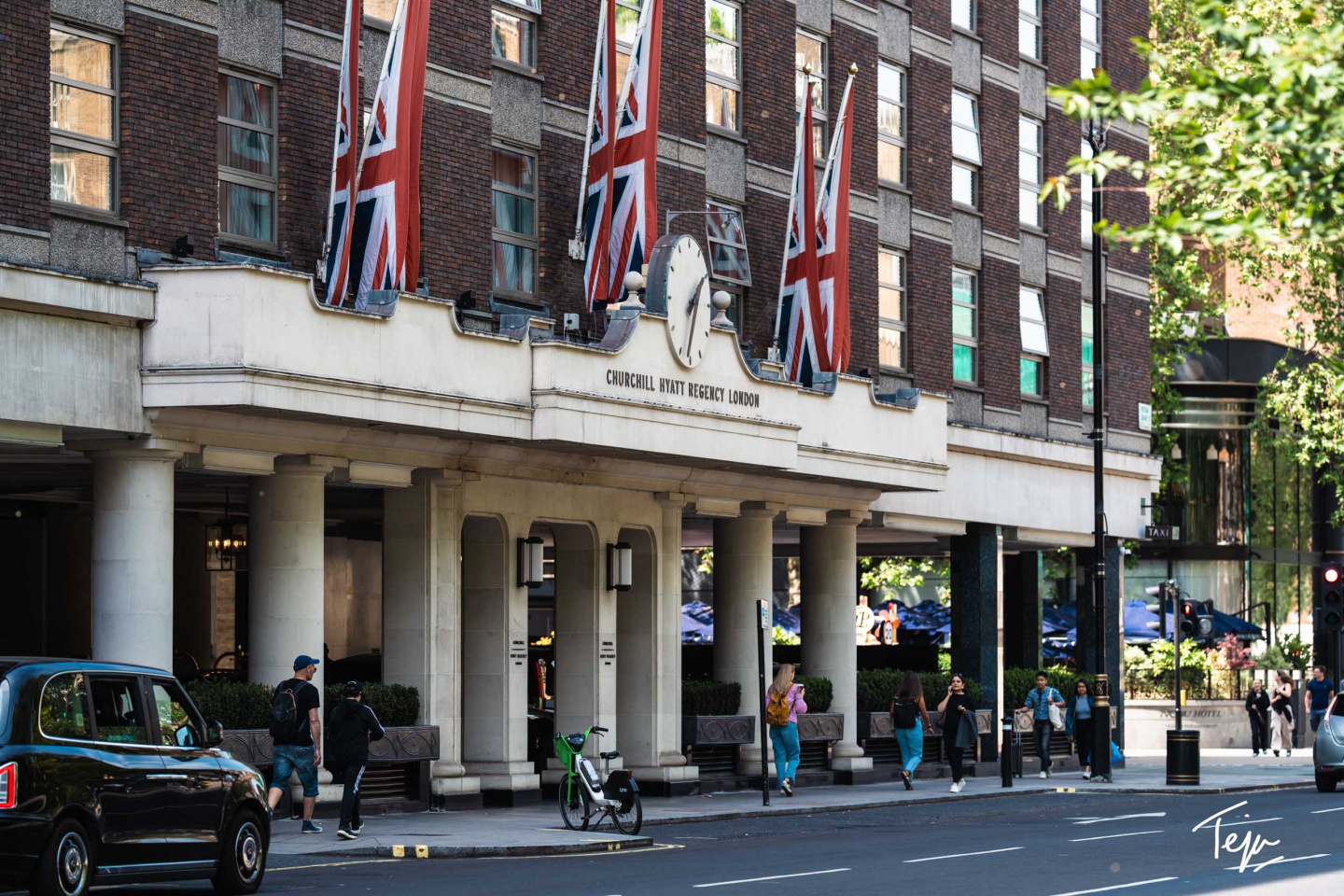 a building with flags on the front