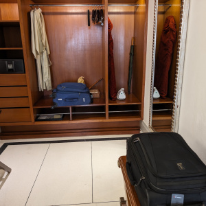 a suitcase in a closet