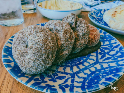 a plate of donuts on a table