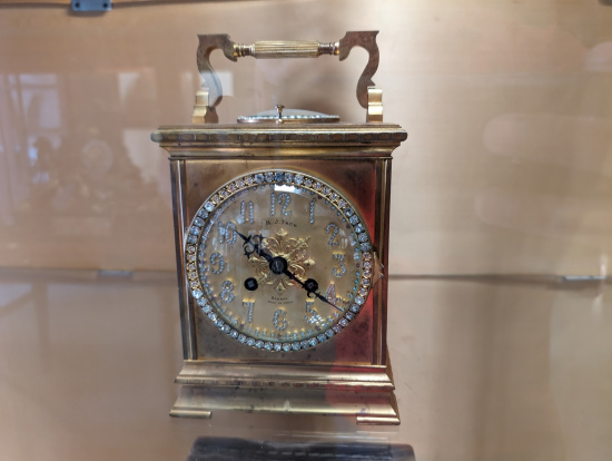 a clock with diamonds on it