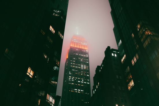 a tall building with lights on top