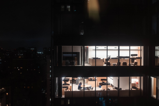 a building with windows at night