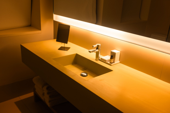 a bathroom sink with a mirror and a mirror on it