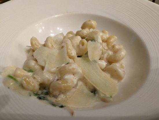 a plate of pasta and cheese