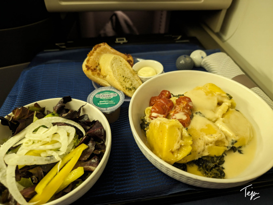 food in a bowl on a tray