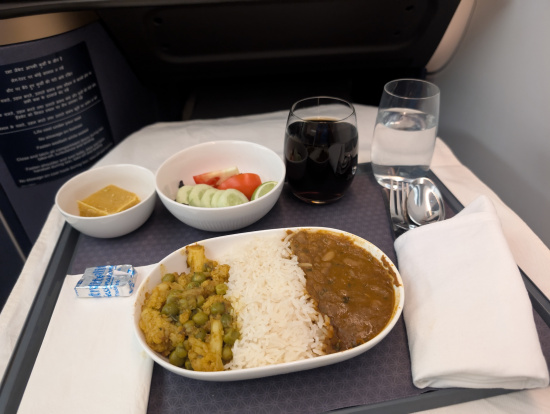 a plate of food on a tray