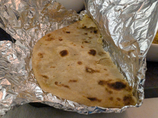 a tortilla in a foil wrapper