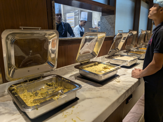 a group of food in containers on a counter