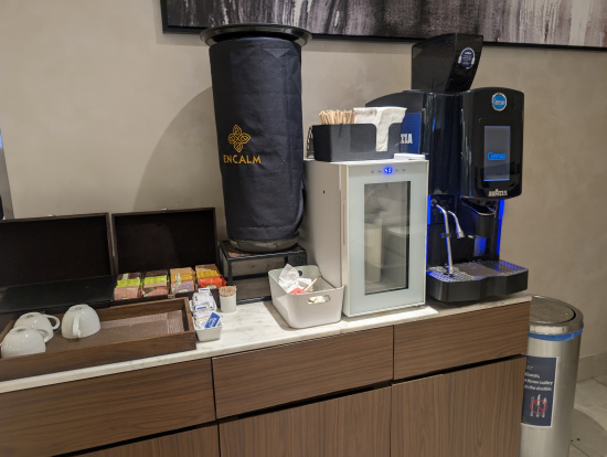 a coffee machine and other items on a counter